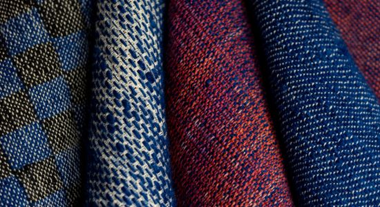 Colourful fabrics are displayed next to each other.