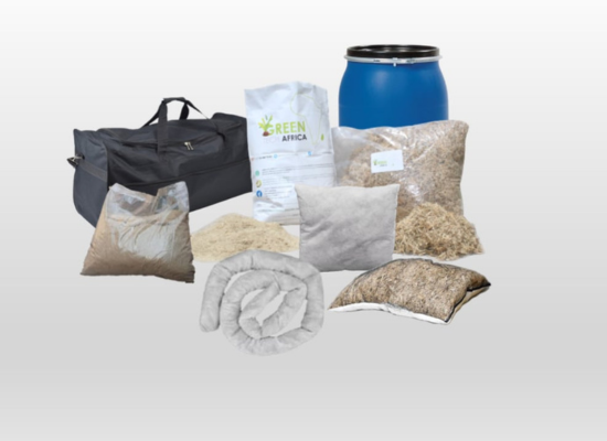 Products of Green Tech Africa: a fibre packed in bags, a tube, a canister, a pillow. Also a black bag in the background